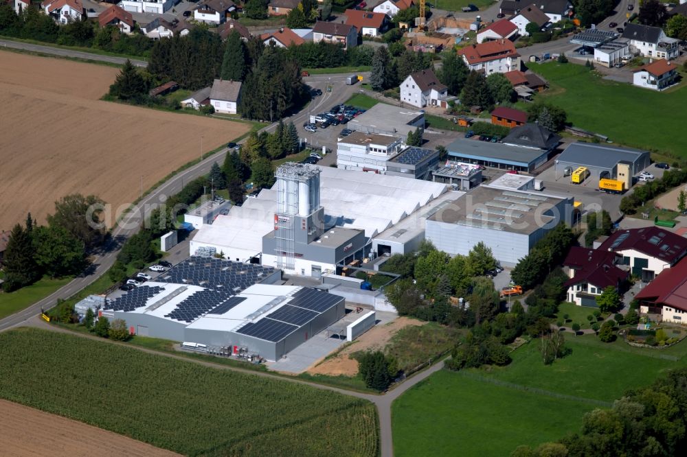 Untergruppenbach from the bird's eye view: Building and production halls on the premises of HAERING GmbH at Muehlstrasse in Untergruppenbach in the state Baden-Wurttemberg, Germany