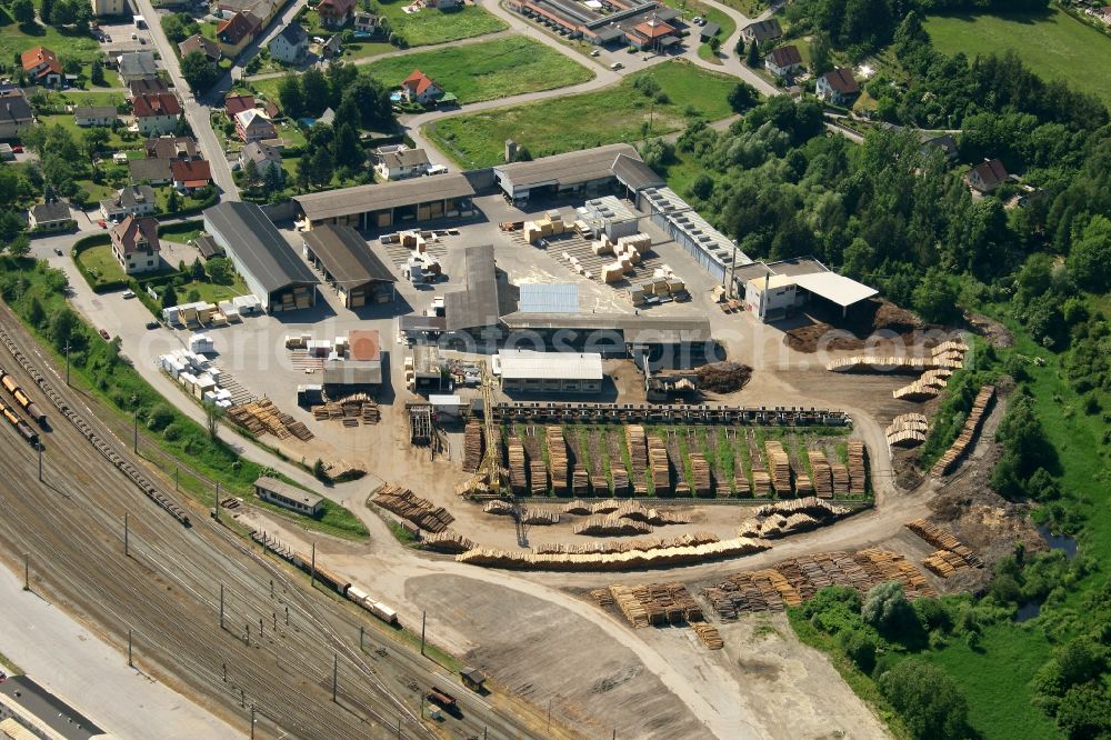 Arnoldstein from above - Building and production halls on the premises HASSLACHER NORICA TIMBER - HASSLACHER Gruppe on the sawmill street in Arnoldstein in Kaernten, Austria