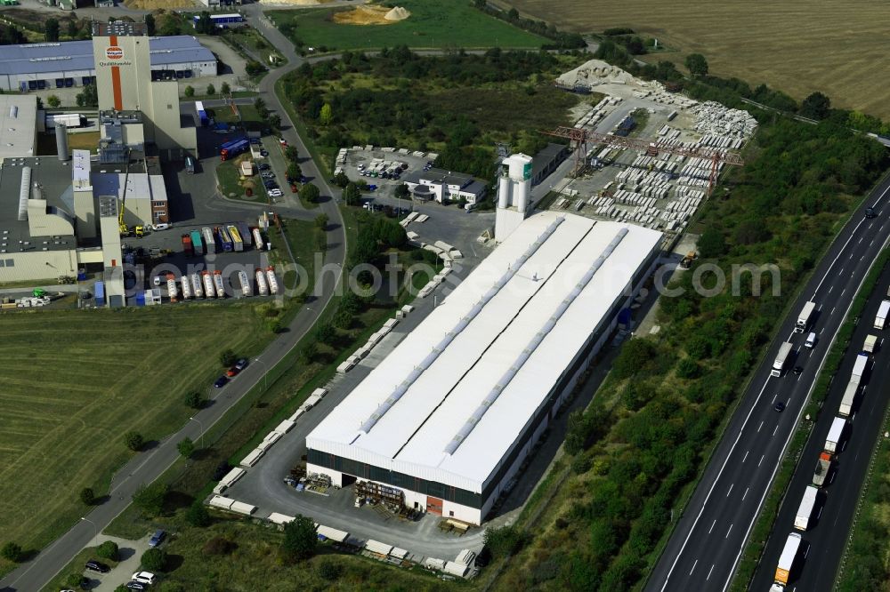 Heidegrund from the bird's eye view: Building and production halls on the premises of Heidelberger Betonelemente GmbH on Muehlenstrasse in the district Weickelsdorf in Heidegrund in the state Saxony-Anhalt, Germany