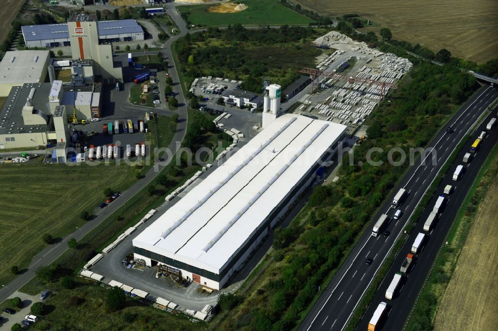 Aerial image Heidegrund - Building and production halls on the premises of Heidelberger Betonelemente GmbH on Muehlenstrasse in the district Weickelsdorf in Heidegrund in the state Saxony-Anhalt, Germany