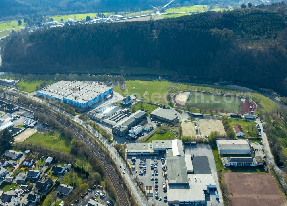 Oeventrop from the bird's eye view: Building and production halls on the premises of Heinrich Schulte Soehne GmbH & Co. KG and das Gelaende of Reit- and Fahrverein Oeventrop e.V. In den Oeren - Widayweg in Oeventrop in the state North Rhine-Westphalia, Germany