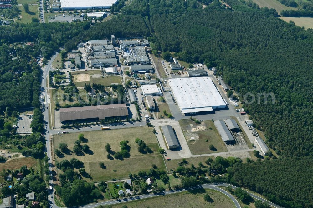 Werder (Havel) from the bird's eye view: Building and production halls on the premises of Herbstreith & Fox KG in Werder (Havel) in the state Brandenburg, Germany