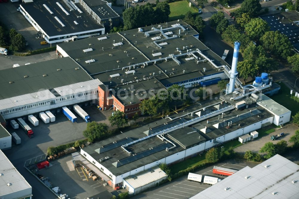 Schenefeld from the bird's eye view: Building and production halls on the premises of Hermes Schleifmittel GmbH & CO. KG on Osterbrooksweg in Schenefeld in the state Schleswig-Holstein