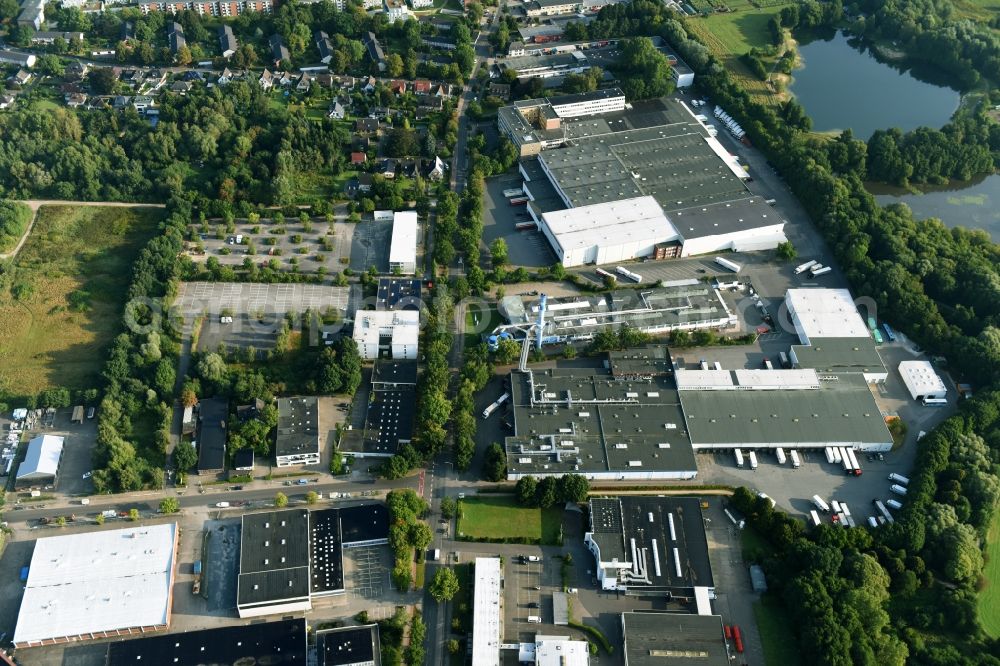 Schenefeld from the bird's eye view: Building and production halls on the premises of Hermes Schleifmittel GmbH & CO. KG on Osterbrooksweg in Schenefeld in the state Schleswig-Holstein