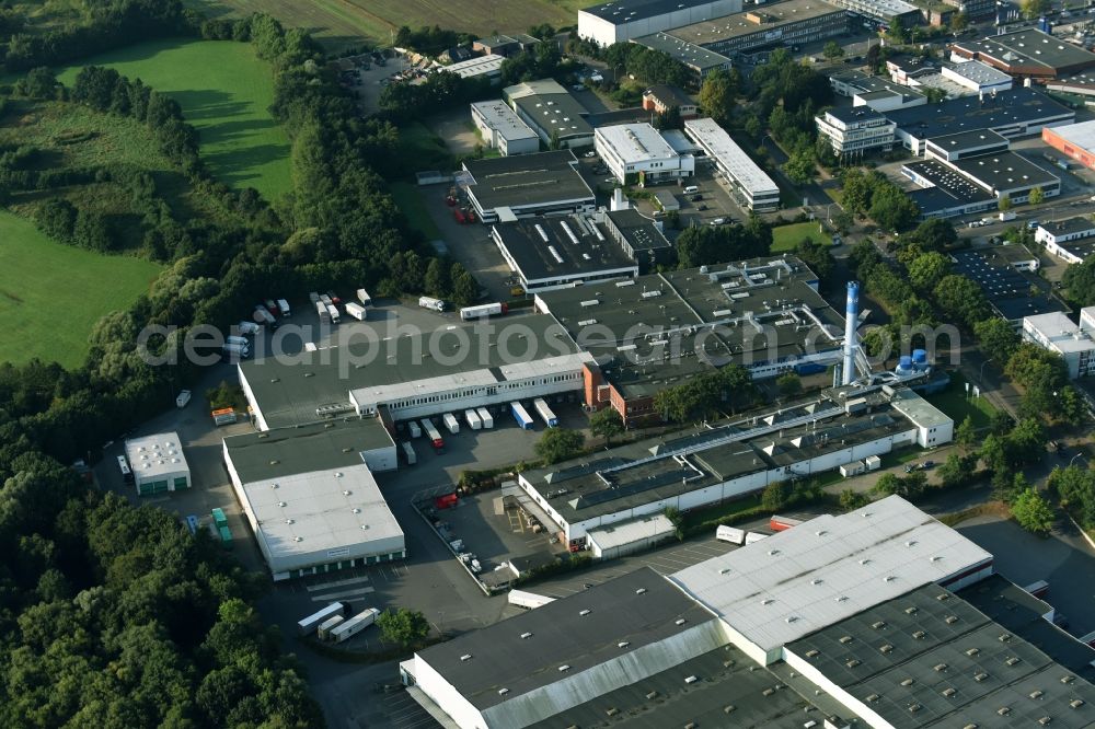 Schenefeld from the bird's eye view: Building and production halls on the premises of Hermes Schleifmittel GmbH & CO. KG on Osterbrooksweg in Schenefeld in the state Schleswig-Holstein