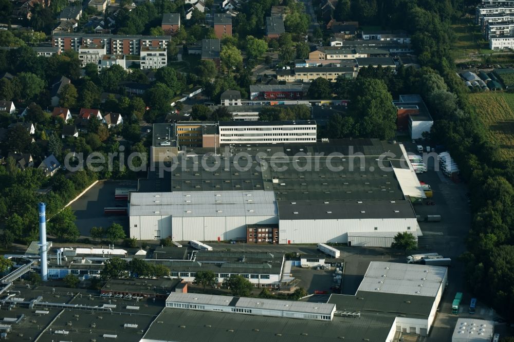 Schenefeld from the bird's eye view: Building and production halls on the premises of Hermes Schleifmittel GmbH & CO. KG on Osterbrooksweg in Schenefeld in the state Schleswig-Holstein