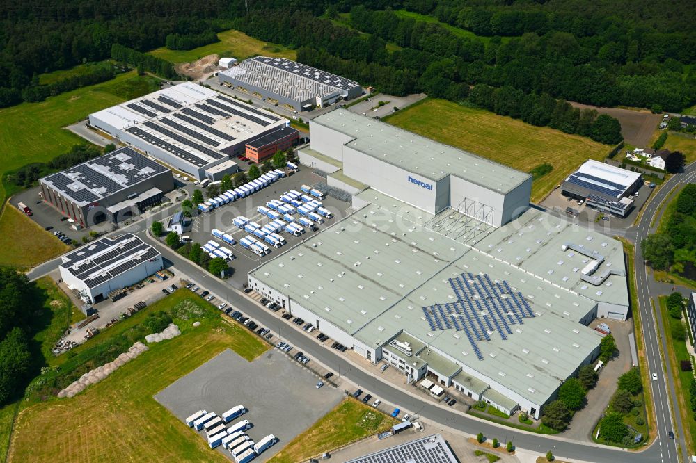 Hövelhof from the bird's eye view: Building and production halls on the premises of heroal - Johann Henkenjohann GmbH & Co. KG on street Heinz-Sallads-Strasse in Hoevelhof in the state North Rhine-Westphalia, Germany