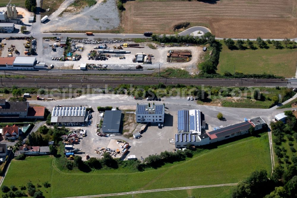 Lauda-Königshofen from the bird's eye view: Building and production halls on the premises of Hofmann Flachdach GmbH & Co.KG in the Eisenbahnstrasse in Lauda-Koenigshofen in the state Baden-Wurttemberg, Germany