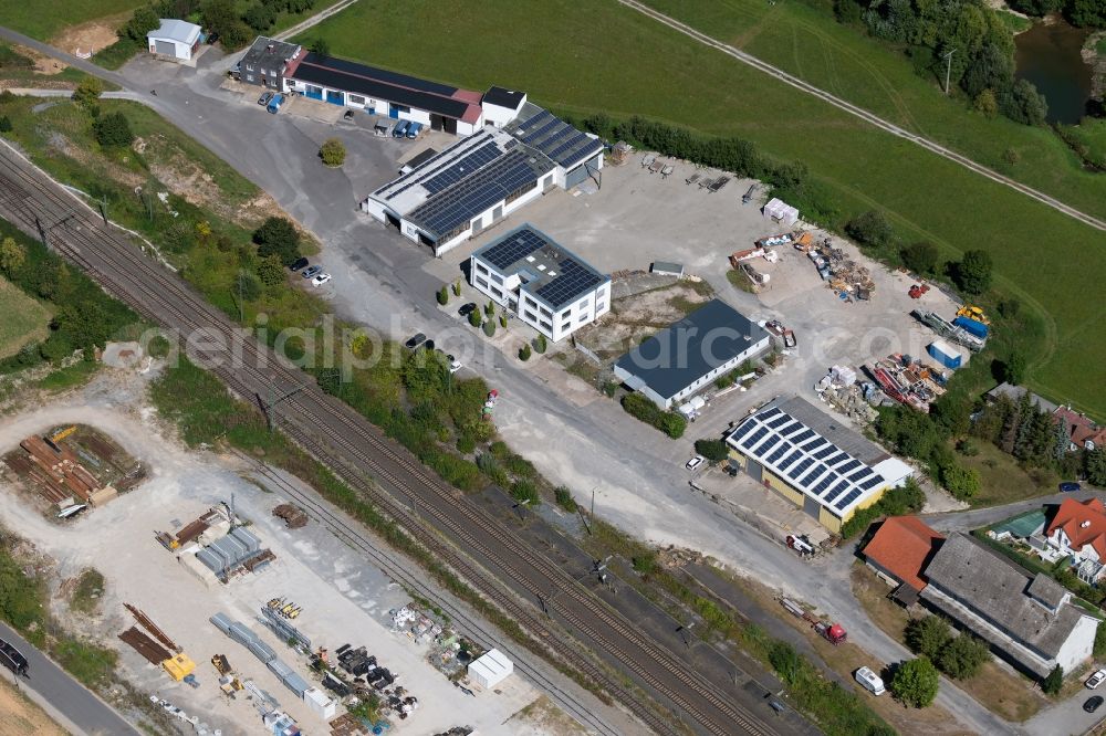 Lauda-Königshofen from above - Building and production halls on the premises of Hofmann Flachdach GmbH & Co.KG in the Eisenbahnstrasse in Lauda-Koenigshofen in the state Baden-Wurttemberg, Germany