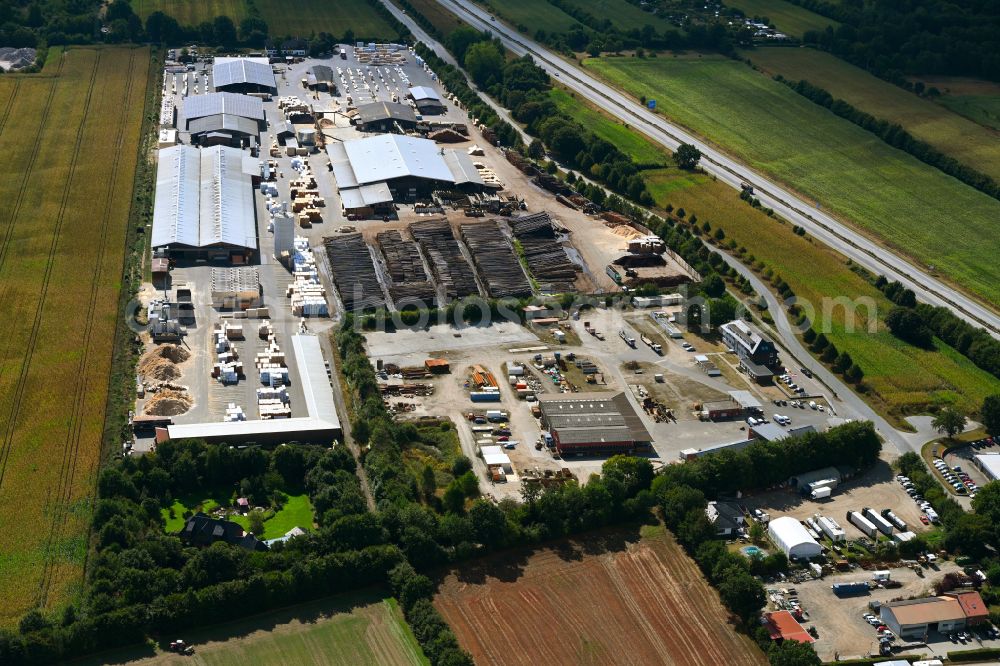 Aerial photograph Bornhöved - Building and production halls on the premises Holz Ruser GmbH & Co. KG on street Kleine Heide in Bornhoeved in the state Schleswig-Holstein, Germany