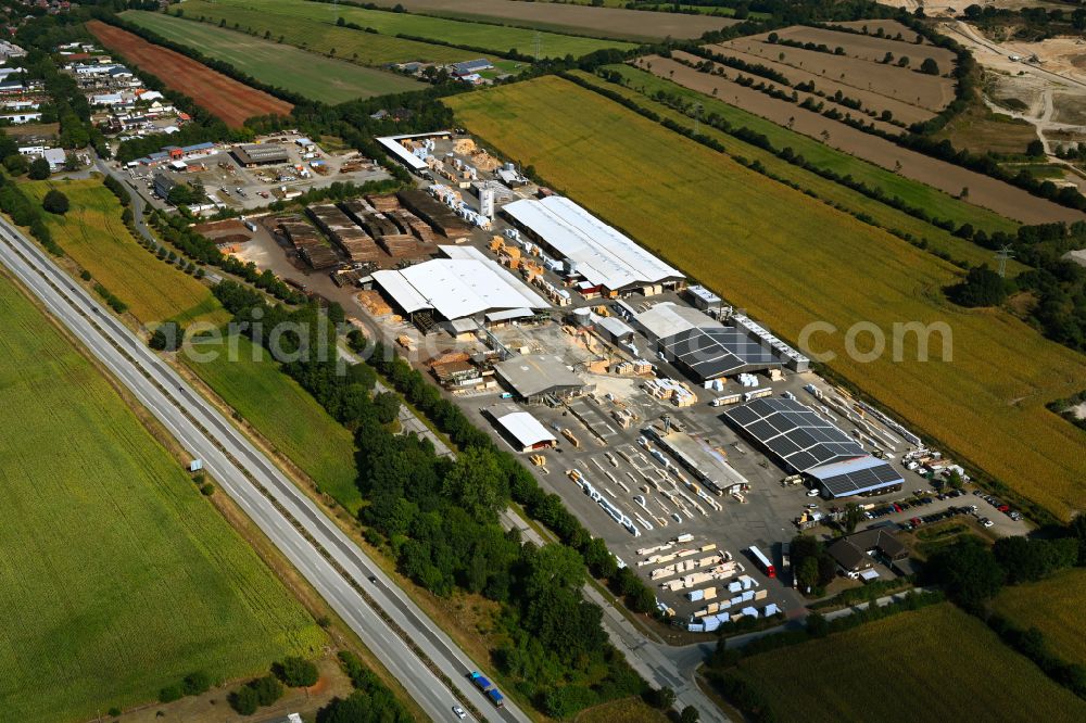 Aerial photograph Bornhöved - Building and production halls on the premises Holz Ruser GmbH & Co. KG on street Kleine Heide in Bornhoeved in the state Schleswig-Holstein, Germany