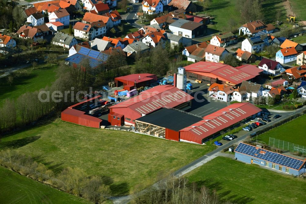 Brand from above - Building and production halls on the premises of Holzbau Gutmann GmbH on Reulbacher Strasse in Brand in the state Hesse, Germany