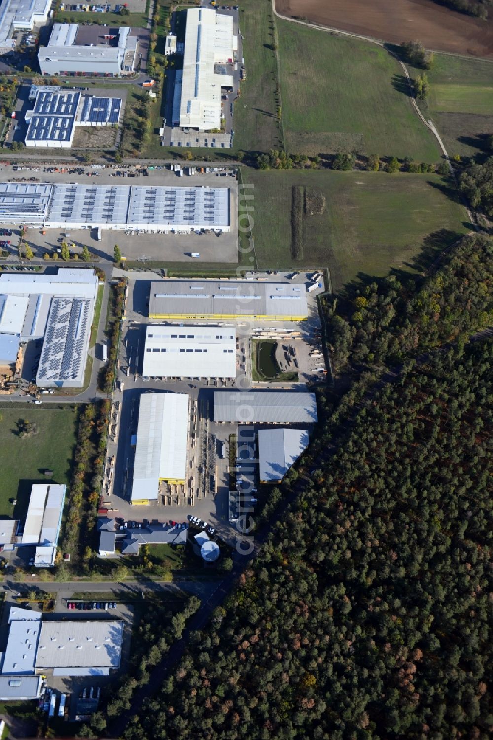 Burg from above - Building and production halls on the premises of Ing.-Holzbau Schnoor GmbH & Co. KG on Tuchmacherweg in Burg in the state Saxony-Anhalt, Germany