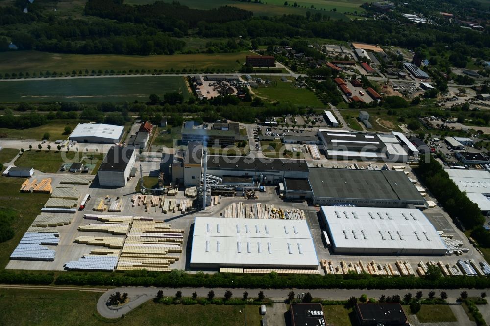 Lübz from the bird's eye view: Building and production halls on the premises IsoVer on Industriestrasse in Luebz in the state Mecklenburg - Western Pomerania, Germany