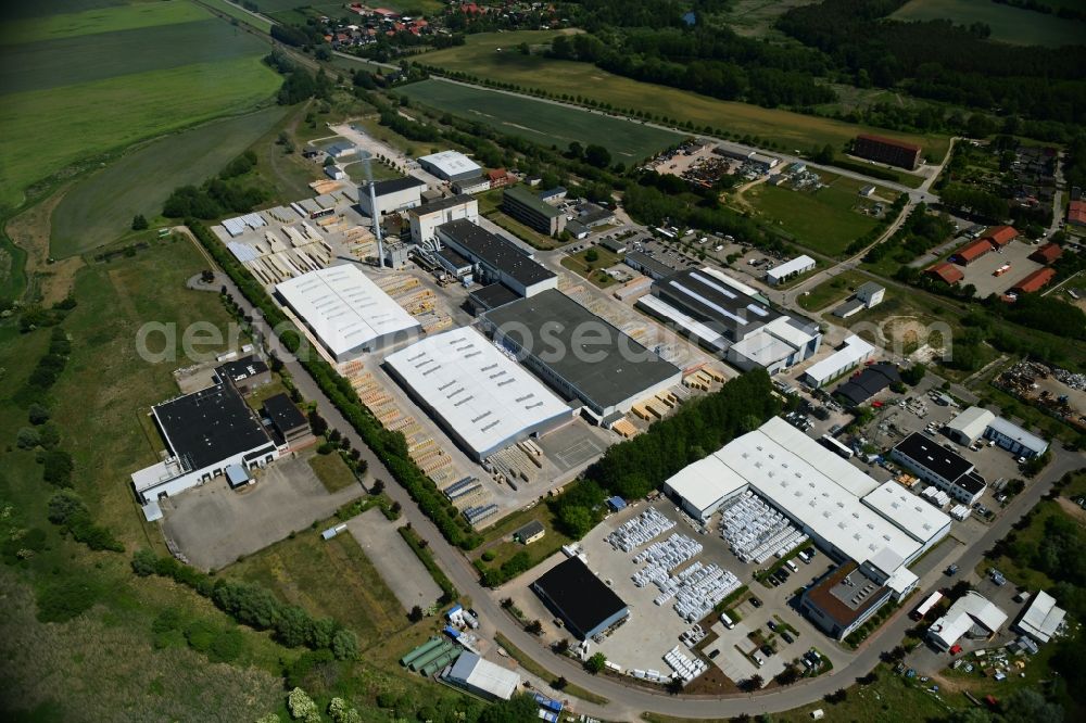 Aerial image Lübz - Building and production halls on the premises IsoVer on Industriestrasse in Luebz in the state Mecklenburg - Western Pomerania, Germany