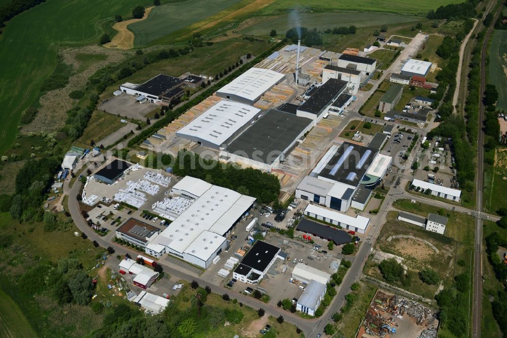 Lübz from the bird's eye view: Building and production halls on the premises IsoVer on Industriestrasse in Luebz in the state Mecklenburg - Western Pomerania, Germany