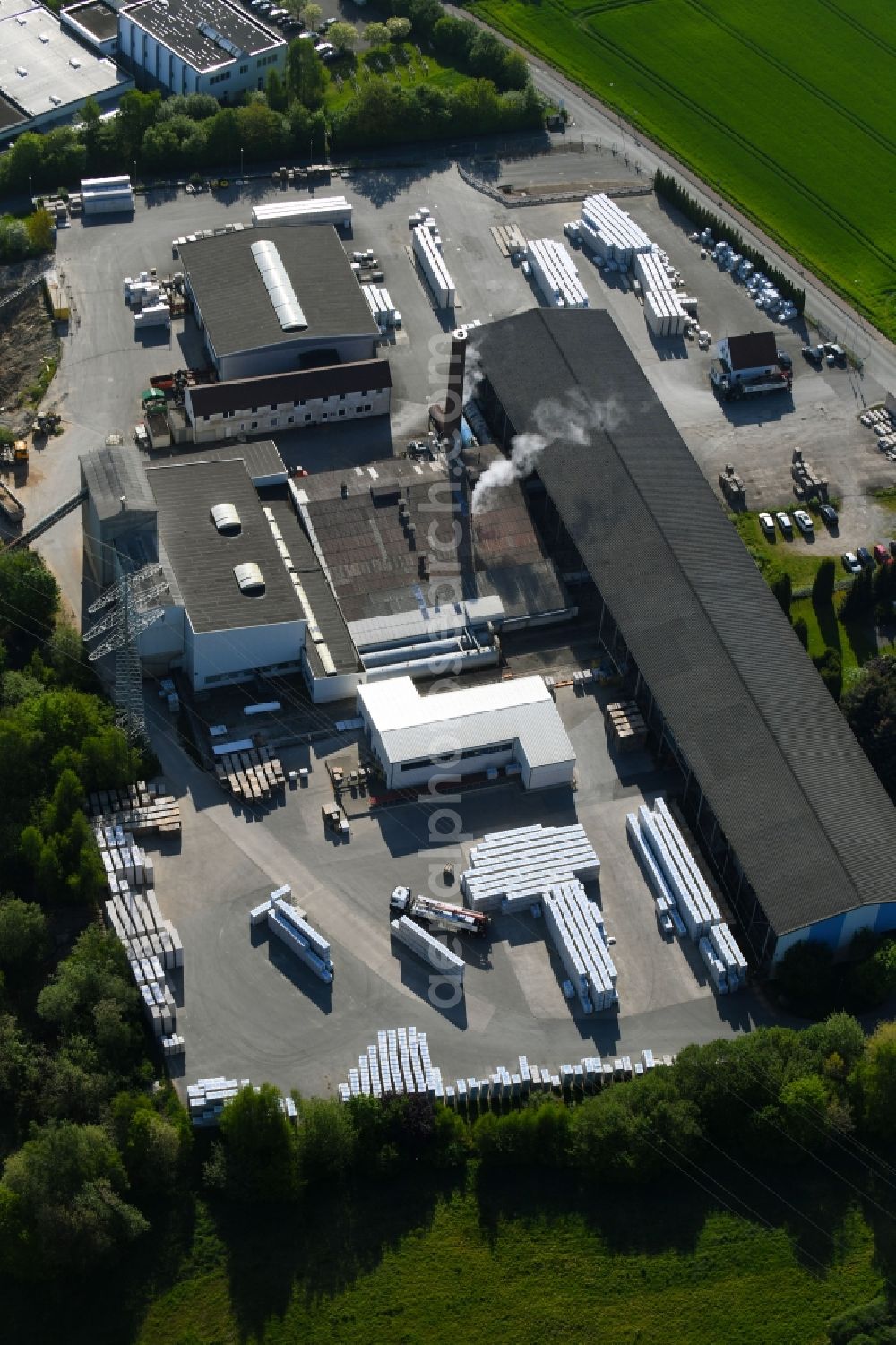 Enger from the bird's eye view: Building and production halls on the premises of Kalksandsteinwerke Westfahlen- Lippe GmbH & Co. KG in Enger in the state North Rhine-Westphalia, Germany