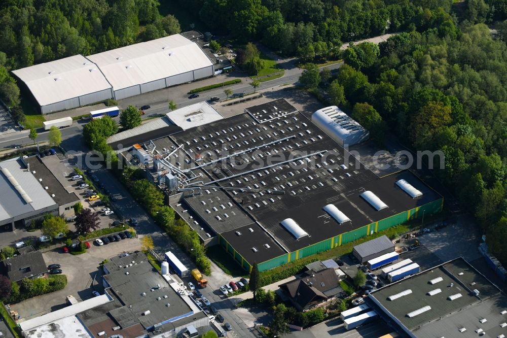 Hiddenhausen from above - Building and production halls on the premises of Karat-Moebelfertigteile GmbH in Hiddenhausen in the state North Rhine-Westphalia, Germany