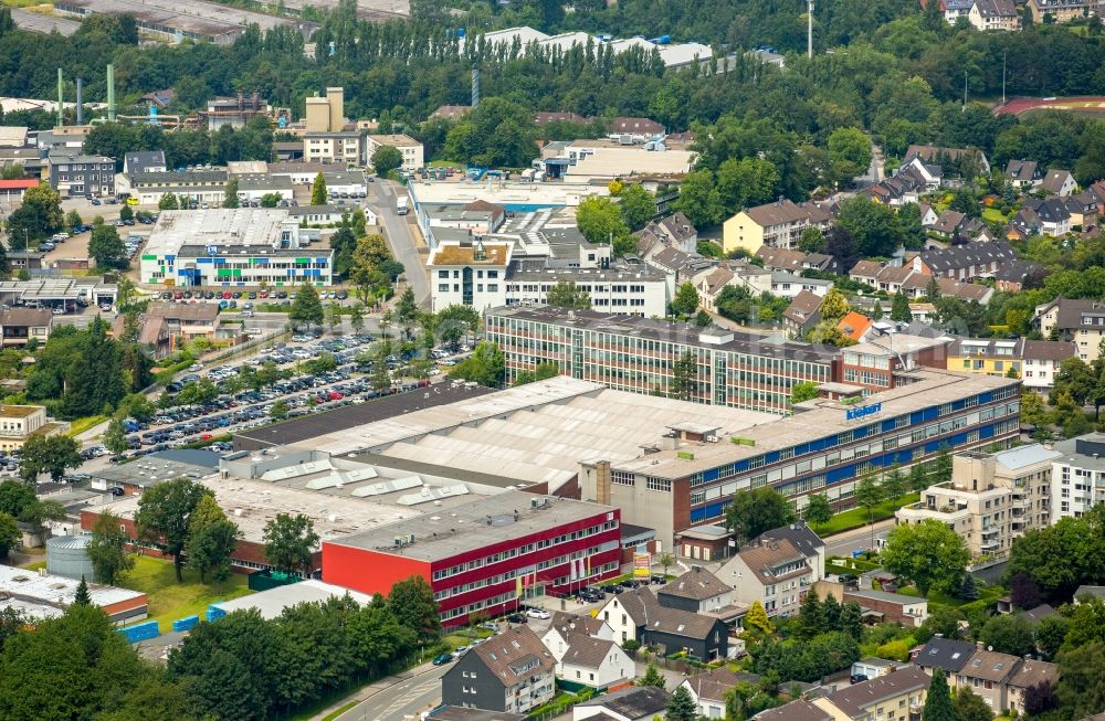 Heiligenhaus from the bird's eye view: Building and production halls on the premises of Kiekert AG on Hoeseler Platz in Heiligenhaus in the state North Rhine-Westphalia. Some buildings on Ratinger Strasse are part of the Campus Velbert/Heiligenhaus of the University for Applied Sciences Bochum