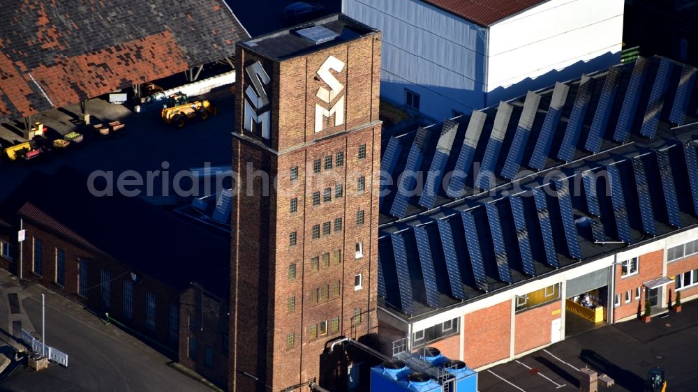 Meckenheim from the bird's eye view: Building and production halls on the premises of Krautfabrik Josef Schmitz KG in Meckenheim in the state North Rhine-Westphalia, Germany