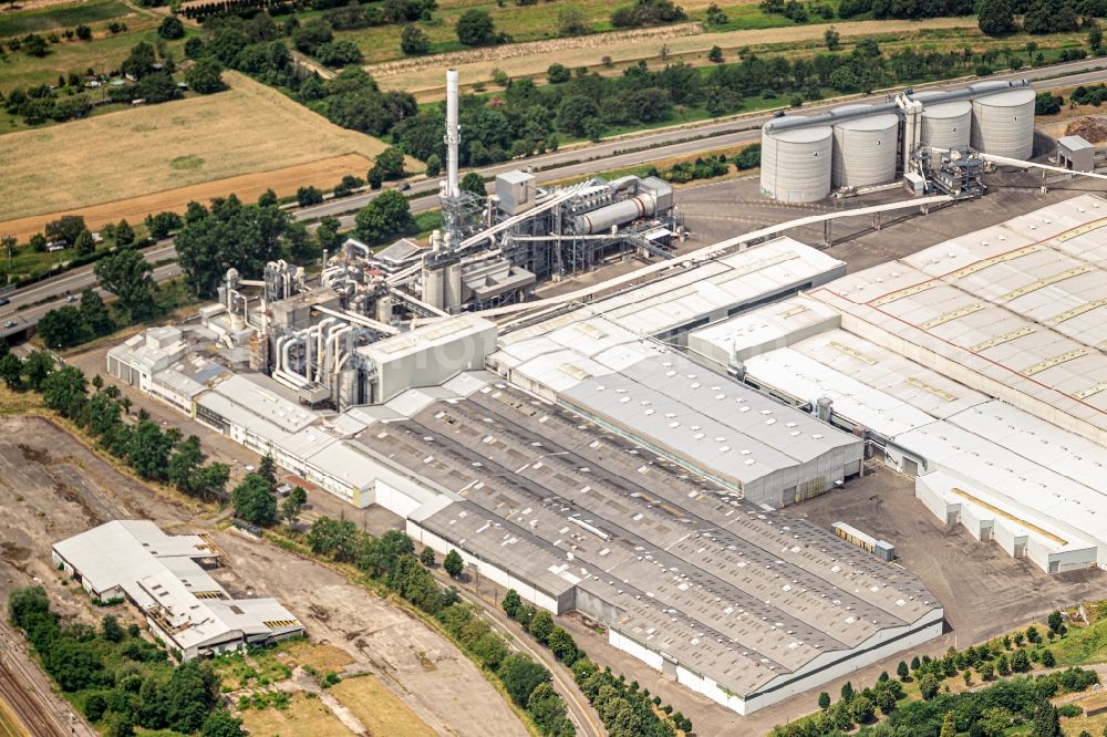 Aerial photograph Bischweier - Building and production halls on the premises of Kronospan Holding GmbH in Bischweier in the state Baden-Wurttemberg, Germany