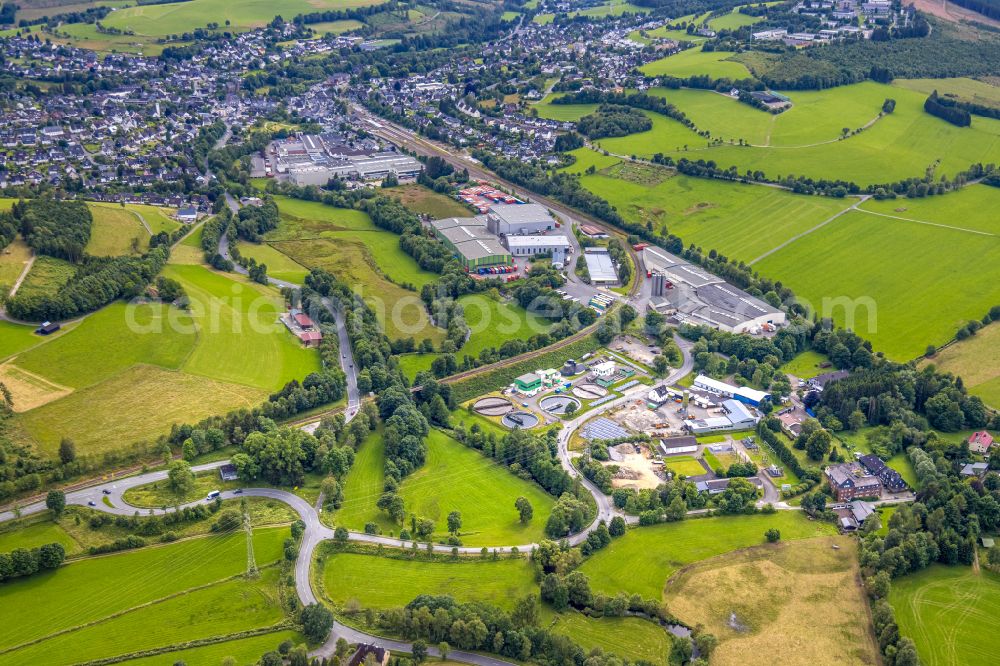 Erndtebrück from the bird's eye view: Building and production halls on the premises of the plastics manufacturer AST Kunststoffverarbeitung GmbH am Muehlenweg in Erndtebrueck on Siegerland in the state North Rhine-Westphalia, Germany