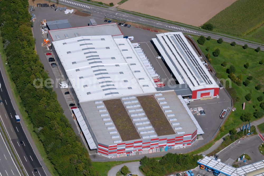 Ilsfeld from above - Building and production halls on the premises of LOeFFELHARDT Heilbronn GmbH at the Hauptstrasse in Ilsfeld in the state Baden-Wurttemberg, Germany