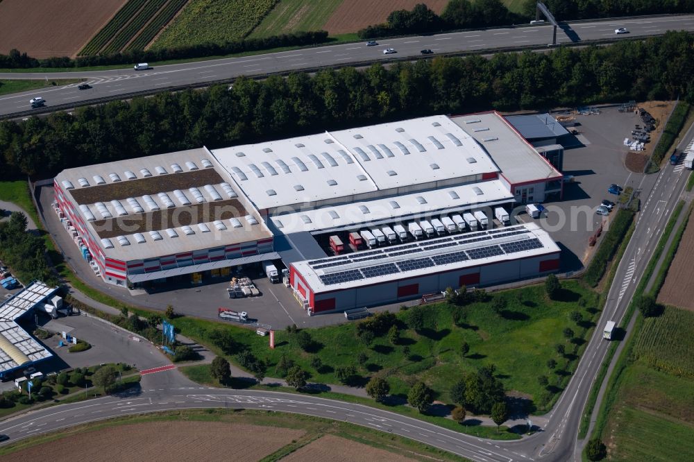 Aerial photograph Ilsfeld - Building and production halls on the premises of LOeFFELHARDT Heilbronn GmbH at the Hauptstrasse in Ilsfeld in the state Baden-Wurttemberg, Germany