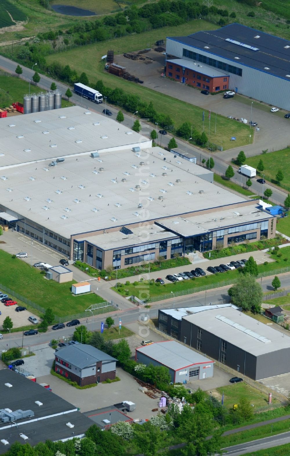 Aerial image Schönberg - Building and production halls on the premises of Lindal Dispenser GmbH in Schoenberg in the state Mecklenburg - Western Pomerania