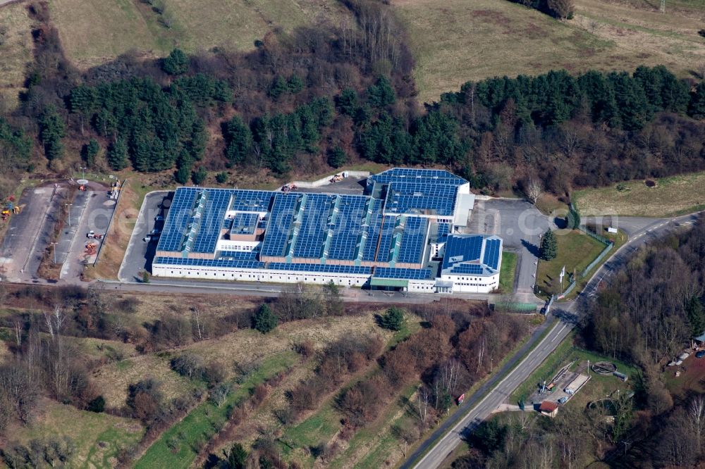 Schwanheim from the bird's eye view: Building and production halls on the premises of Lugina Schuhfabrik GmbH in Schwanheim in the state Rhineland-Palatinate, Germany