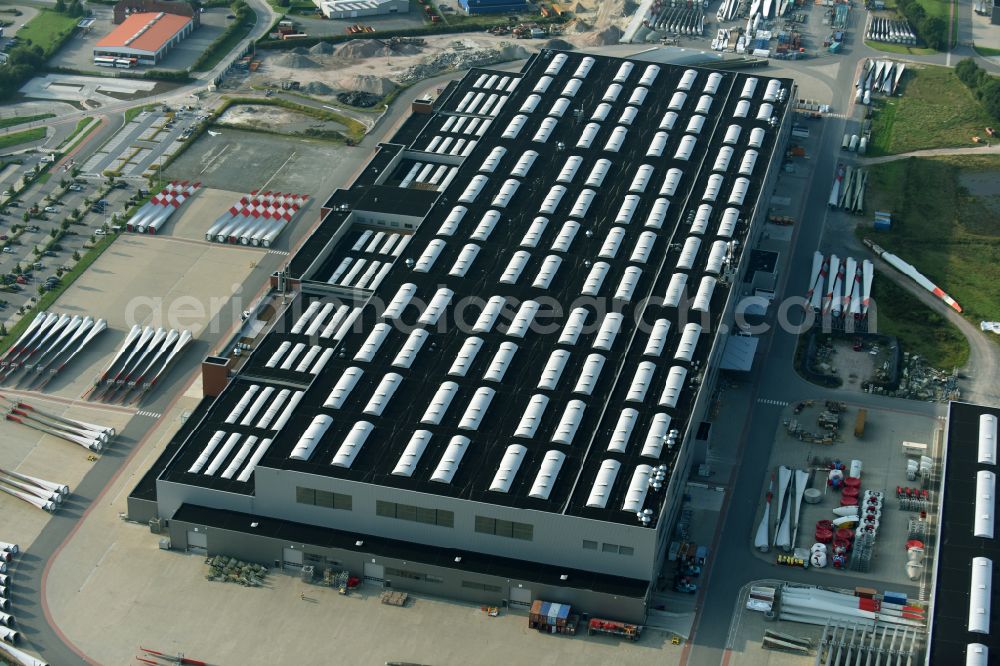 Aurich from the bird's eye view: Building and production halls on the premises of Mechanic Anlagenbau GmbH on street Abelweg - Borsigstrasse in the district Sandhorst in Aurich in the state Lower Saxony, Germany