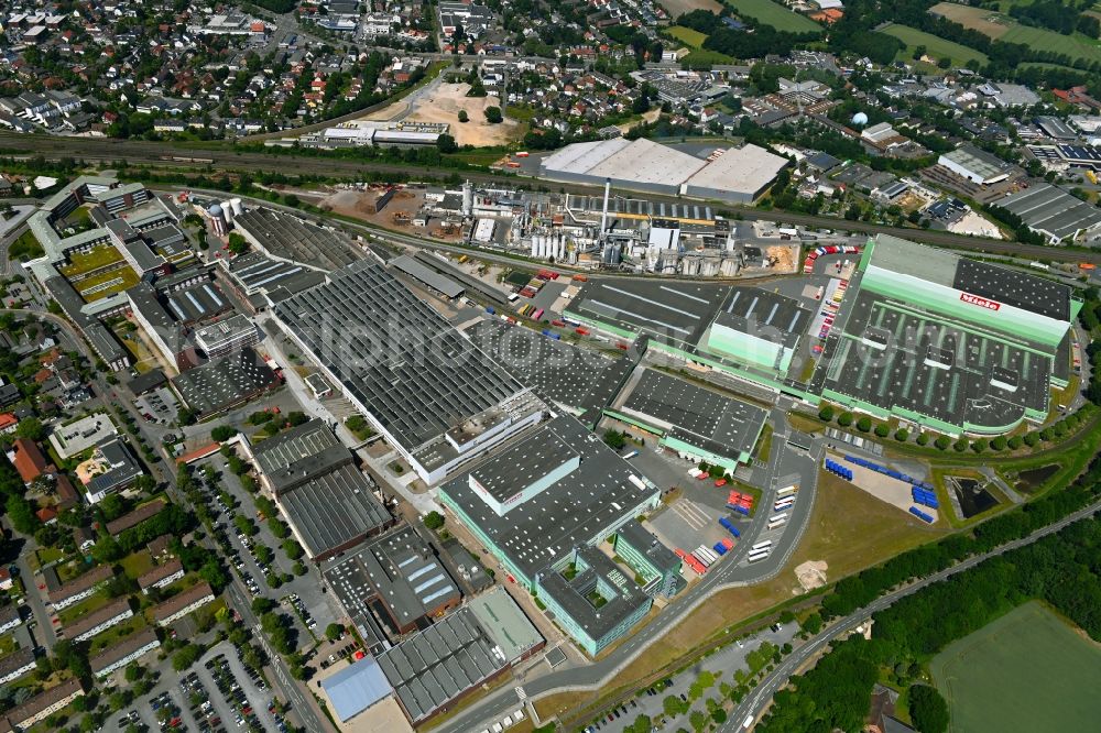 Aerial photograph Gütersloh - Building and production halls on the premises of Miele Vertriebsgesellschaft Deutschland KG on Carl-Miele-Strasse in the district Spexard in Guetersloh in the state North Rhine-Westphalia, Germany