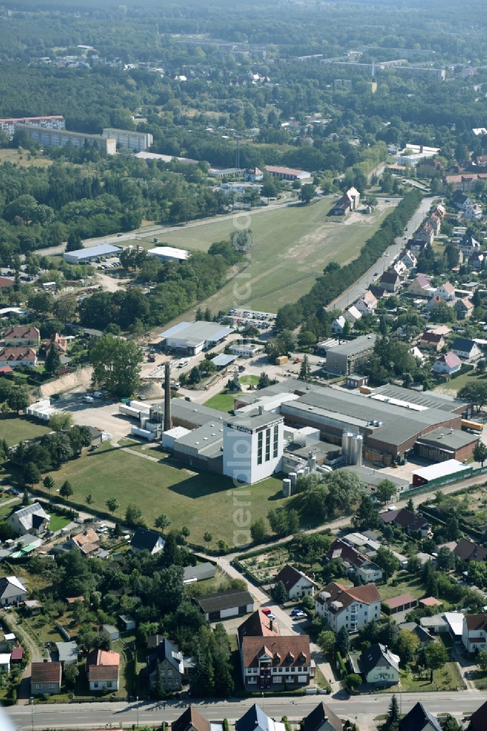 Aerial image Rathenow - Building and production halls on the premises of MILCAFEA GMBH in Rathenow in the state Brandenburg