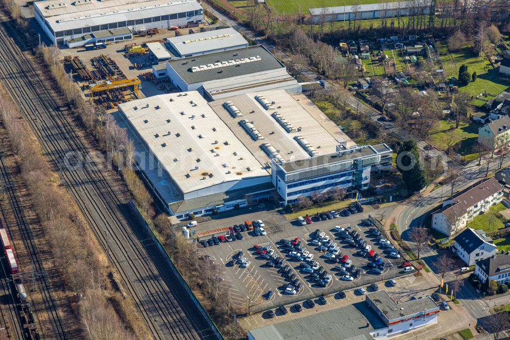 Aerial image Holzwickede - Building and production halls on the premises of Montanhydraulik GmbH on Bahnhofstrasse in Holzwickede in the state North Rhine-Westphalia, Germany