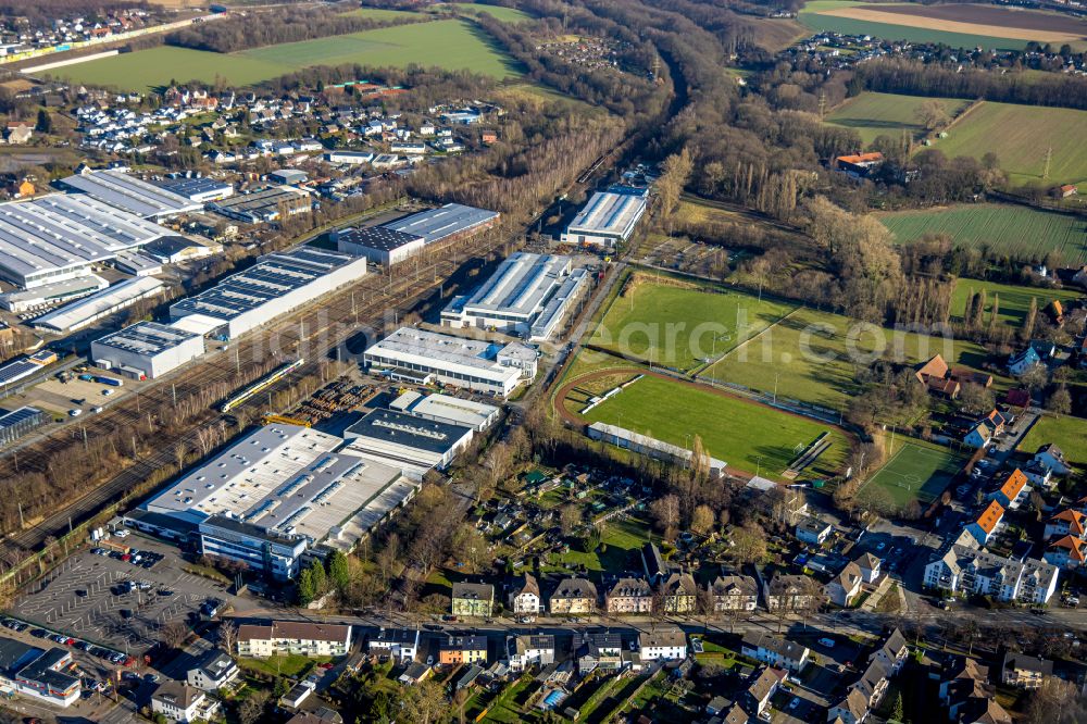 Aerial photograph Holzwickede - Building and production halls on the premises of Montanhydraulik GmbH on Bahnhofstrasse in Holzwickede in the state North Rhine-Westphalia, Germany