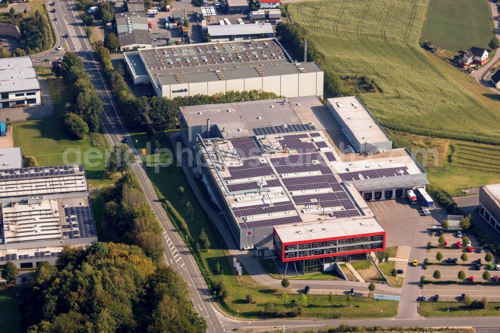 Lüdenscheid from the bird's eye view: Building and production halls on the premises of Nanogate Vogler Systems GmbH entlang of Rosenweg in Schalksmuehle in the state North Rhine-Westphalia, Germany