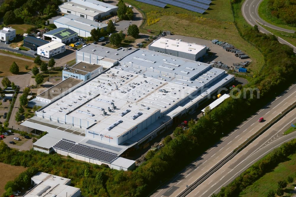 Aerial photograph Neuenstadt am Kocher - Building and production halls on the premises of the Neumeister Hydraulik GmbH at the Otto-Neumeister-Strasse in Neuenstadt am Kocher in the state Baden-Wurttemberg, Germany