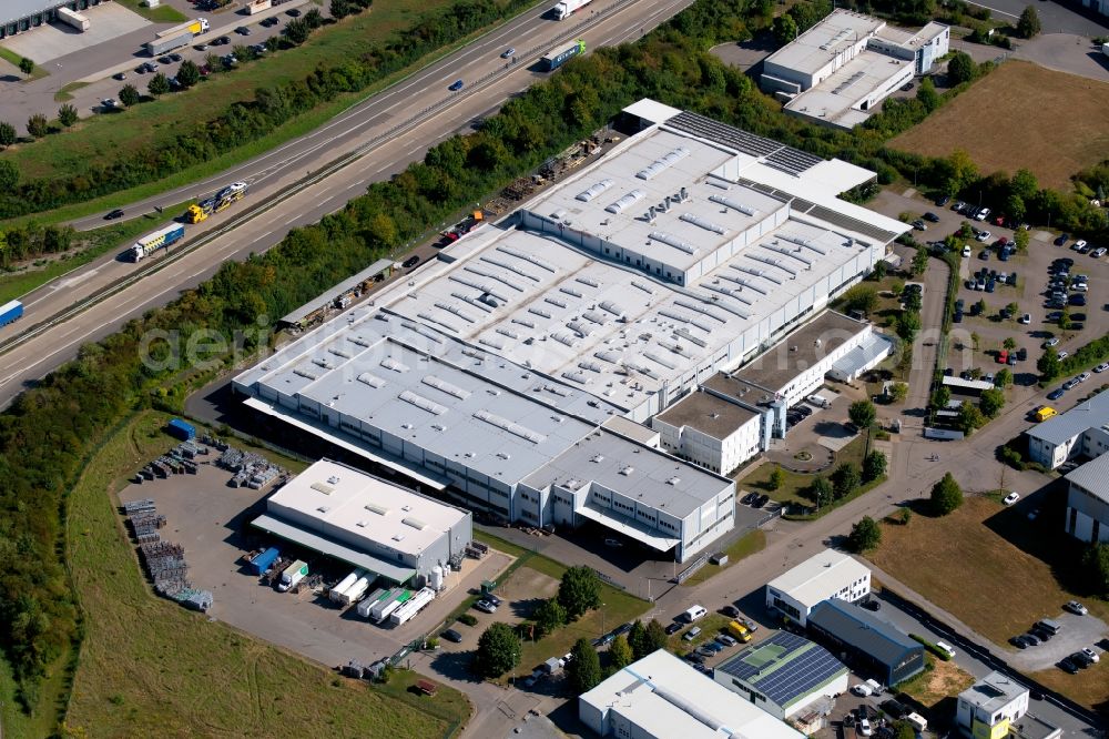 Neuenstadt am Kocher from the bird's eye view: Building and production halls on the premises of the Neumeister Hydraulik GmbH at the Otto-Neumeister-Strasse in Neuenstadt am Kocher in the state Baden-Wurttemberg, Germany