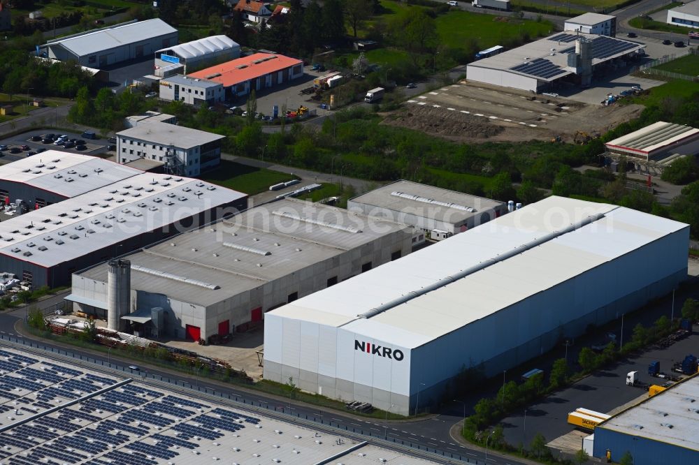 Radeburg from above - Building and production halls on the premises of Nikro Radeburg GmbH in the district Berbisdorf in Radeburg in the state Saxony, Germany