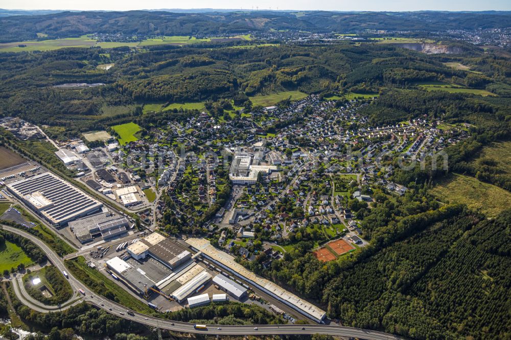 Menden (Sauerland) from the bird's eye view: Building and production halls on the premises of OBO Bettermann Holding GmbH & Co. KG on Hueingser Ring in the district Hueingsen in Menden (Sauerland) in the state North Rhine-Westphalia, Germany