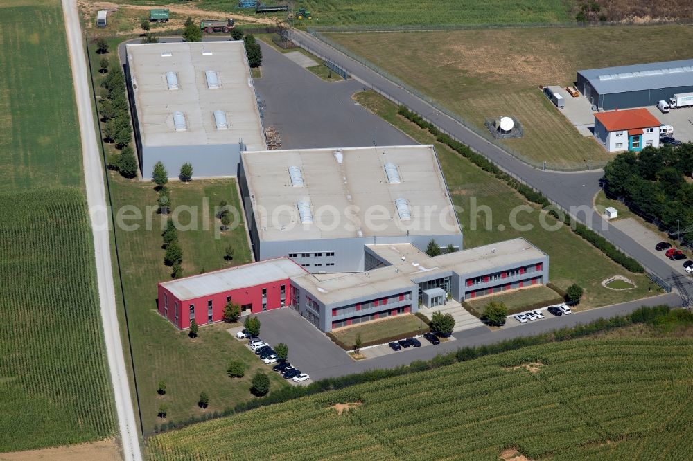 Aerial photograph Grünsfeld - Building and production halls on the premises of OCTO Actuators GmbH in the De-Werth-Str. in Gruensfeld in the state Baden-Wurttemberg, Germany