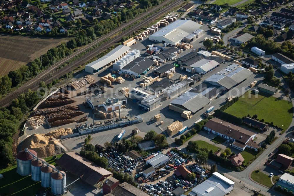 Bassum from the bird's eye view: Building and production halls on the premises Palettenfabrik Bassum GmbH on Carl-Zeiss-Strasse in Bassum in the state Lower Saxony, Germany