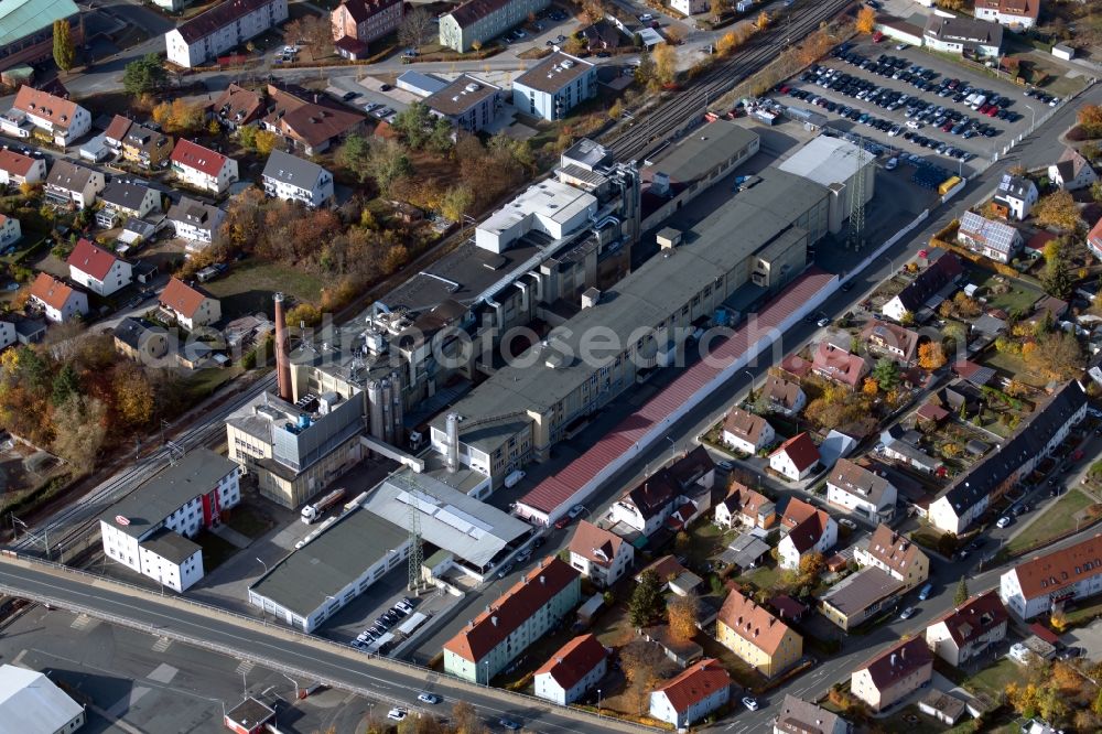 Forchheim from the bird's eye view: Building and production halls on the premises of Piasten GmbH on Piastenstrasse in the district Buckenhofen in Forchheim in the state Bavaria, Germany