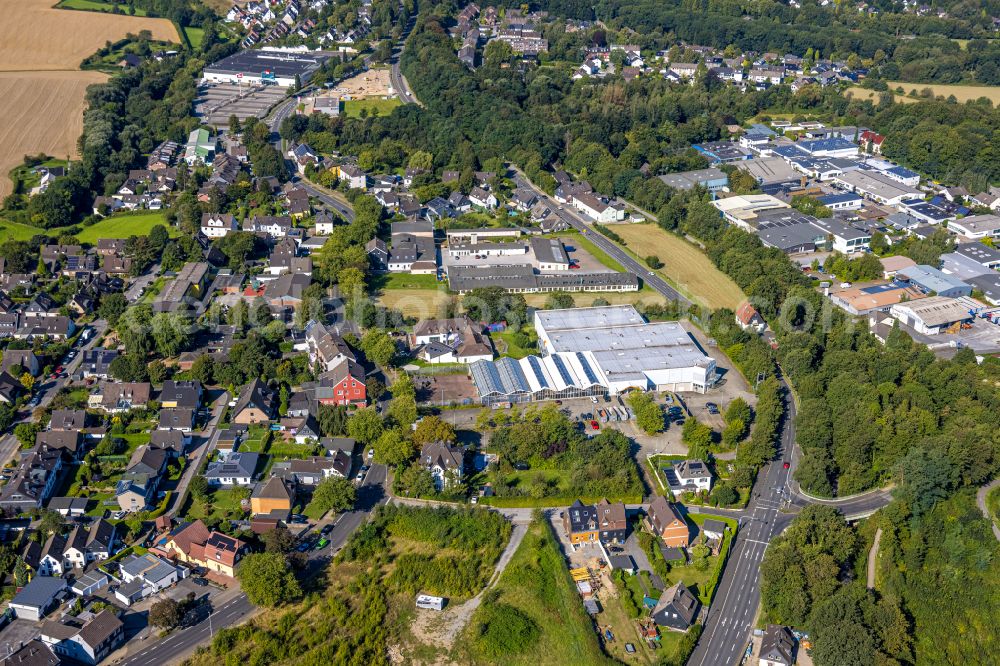 Heiligenhaus from above - Building and production halls on the premises of PST - professional support technologies gmbh on street Velberter Strasse in the district Hetterscheidt in Heiligenhaus at Ruhrgebiet in the state North Rhine-Westphalia, Germany