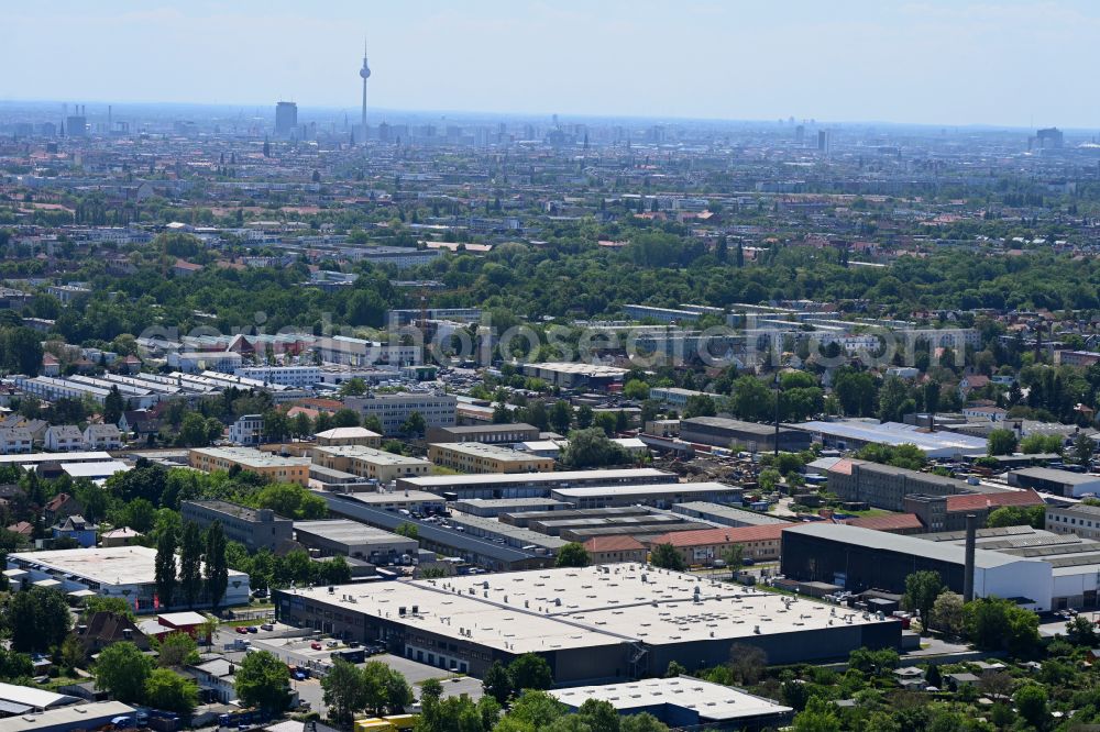 Berlin from the bird's eye view: Building and production halls on the premises of Remmers GmbH on street Buchholzer Strasse in the district Niederschoenhausen in Berlin, Germany