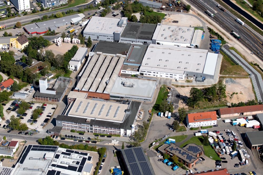 Aerial photograph Schwabach - Building and production halls on the premises of the Richard Bergner Holding GmbH & Co. KG AG Nuernberg, HRA 9293 in the Industriestrasse in Schwabach in the state Bavaria, Germany