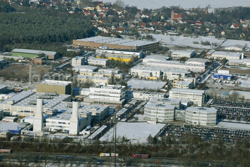 Dahlewitz from the bird's eye view: Building and production halls on the premises of Rolls-Royce Deutschland on Eschenweg in Dahlewitz in the state Brandenburg, Germany