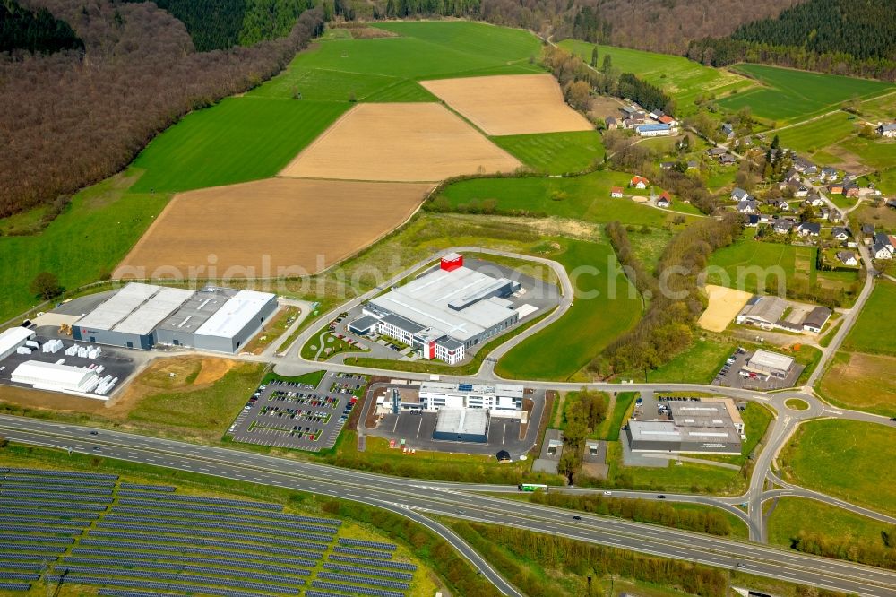 Aerial photograph Meschede - Building and production halls on the premises of Schraubtechnik ITH Bolting Technology on Steinwiese in the district Enste in Meschede in the state North Rhine-Westphalia