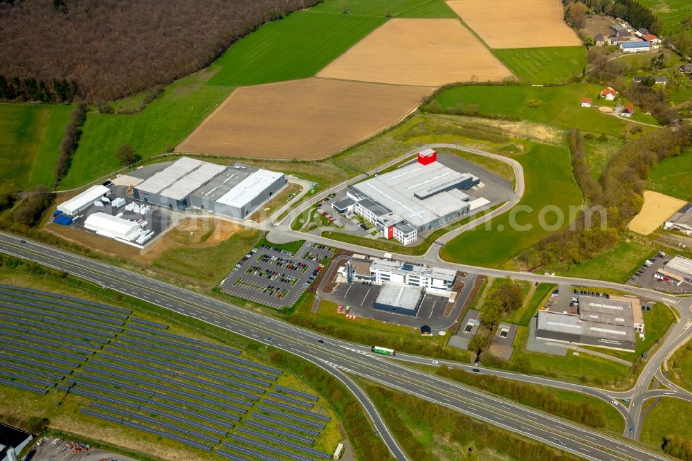 Meschede from the bird's eye view: Building and production halls on the premises of Schraubtechnik ITH Bolting Technology on Steinwiese in the district Enste in Meschede in the state North Rhine-Westphalia