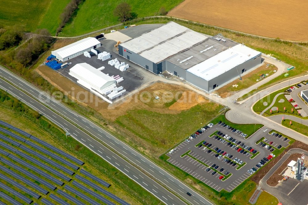 Aerial image Meschede - Building and production halls on the premises of Schraubtechnik ITH Bolting Technology on Steinwiese in the district Enste in Meschede in the state North Rhine-Westphalia